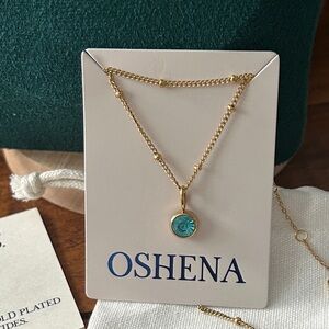 Oshena Designer Beachwear Gold Plated Necklace with turquoise Blue Pendant